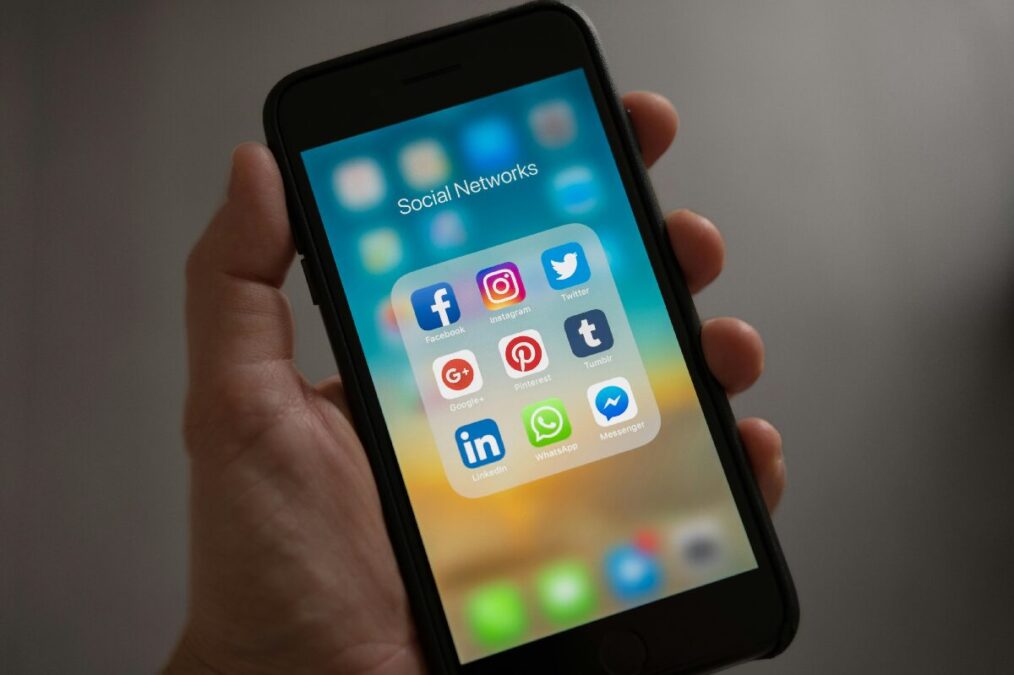 How-Social-Media-Is-Changing-Sports-Viewing-social-media-apps-opened-on-mobile-phone