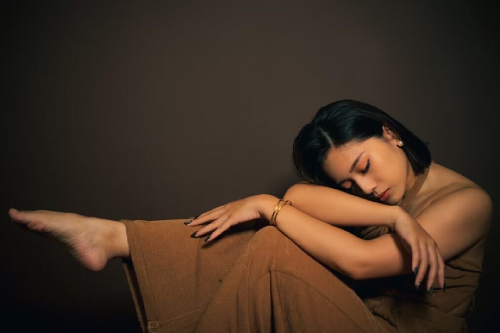 woman-relaxing-using-stress-reliever-to-ease-herself